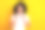照片中兴奋梦幻的女人穿着白色t恤听着歌曲，耳机看着空旷的空间孤立的黄色背景图片下载