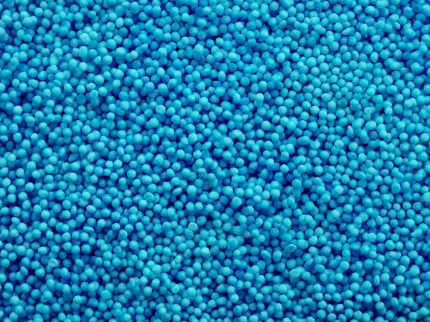 小蓝色珠子特写背景。复活节烘焙装饰图片下载