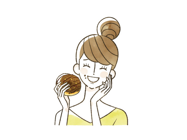 一个女人微笑着吃着甜甜圈图片下载