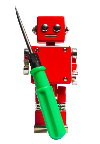 红色玩具机器人与螺丝刀的孤立照片。图片下载