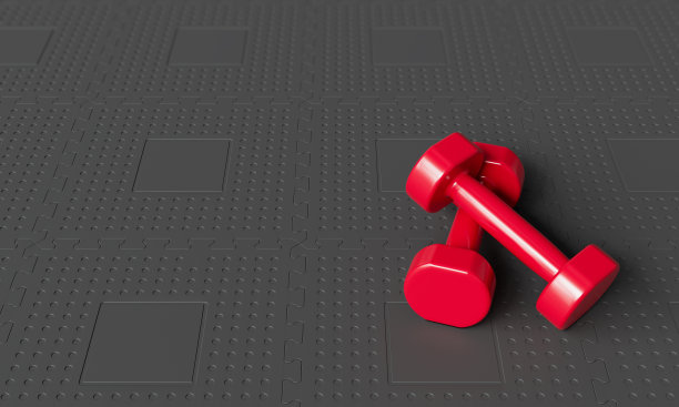 黑色橡胶垫子上的红色哑铃。3D渲染图片下载