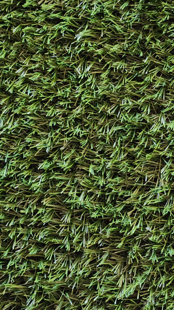 绿色人造草坪图案，纹理为背景。库存图片图片下载