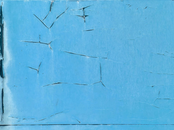 一幅画着蓝色墙壁和破碎窗户的照片。图片下载