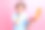 印象深刻的开朗女孩的照片，手触摸脸颊，抱无线笔记本电脑孤立在粉红色的背景图片下载