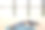 下载瑜伽课程图片。室内瑜伽体式。体育娱乐活动。美丽的年轻女子在瑜伽姿势与瑜伽轮。个人运动。图片下载