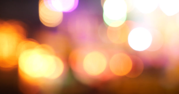 彩色散景抽象模糊背景音乐节舞台表演晚会。充满活力的散景背景火花动画运动。背景显示与闪烁的夜生活形状闪烁灯图片下载