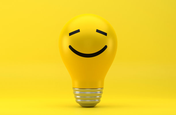 灯泡和快乐的表情符号图片下载