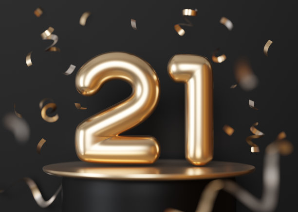 金色的，闪亮的数字21在黑色的背景与飘落的五彩纸屑。21岁的象征。二十一岁生日聚会或公司周年庆邀请函。3 d渲染。图片下载