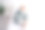 照片肖像漂亮的金发女郎躺在床上抱着枕头穿着时尚的灰色睡衣明亮的卧室室内设计图片下载