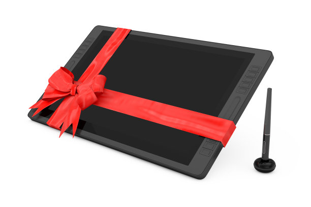 大尺寸的数字图形绘图平板显示器与笔和空白屏幕作为礼物与红丝带和蝴蝶结。3d渲染图片下载