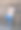 一个留着黑胡子、穿着浅色衣服的现代时尚的巴基斯坦男人站在石墙旁边图片下载