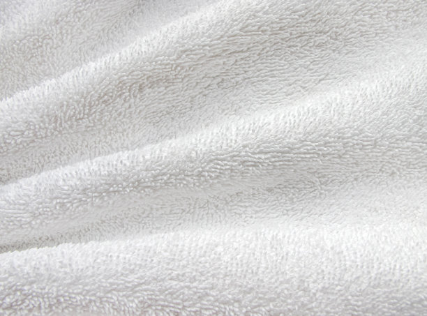白色软皱毛巾布毯纹理背景，壁纸，背景与空间的文字。图片下载