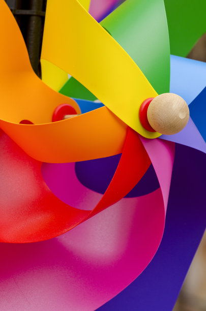 多色风车的孩子-股票照片图片下载