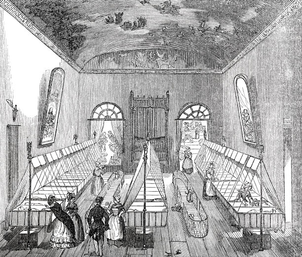 可怜孩子的摇篮卧室，许多床排成一排图片下载