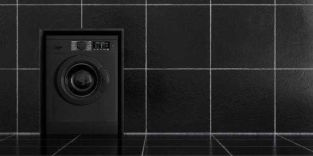 黑色瓷砖浴室中的现代黑色洗衣机。3d渲染图片下载