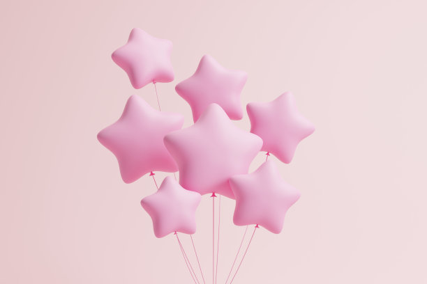 一组星星形状的粉色气球漂浮在粉色粉彩的背景上图片下载