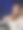 一个迷人的红发女人在电影院里的特写照片，头上戴着3D眼镜，坐在一排层层叠叠的蓝色电影院座位上，手里拿着装着蒸Momos(南亚饺子)的硬纸板托盘，里面有白面粉和水面团，里面装满了猪肉和混合蔬菜图片下载