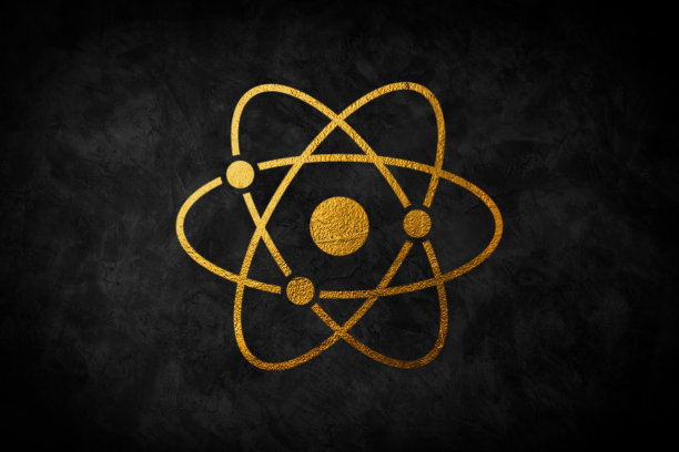 金色科学符号原子，孤立在黑色背景上图片下载