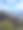 一个人站在悬崖上看山的照片。图片下载