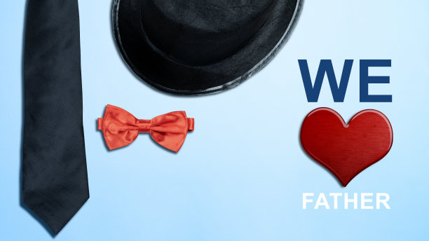 黑色的帽子和红色的领结，上面有一颗红心和我们爱父亲的文字图片下载
