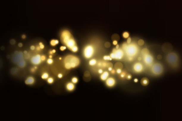 在黑暗背景上模糊闪亮的散景。节日的背景。图片下载