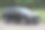 一辆黑色的GMC阿卡迪亚SLT SUV在休斯顿市中心赫尔曼公园附近巡航图片下载
