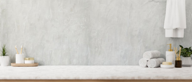 一个现代豪华的浴室桌子设有洗漱用具和展示产品的空间。图片下载