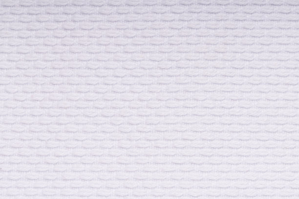 空手道或柔道制服Gi的微距镜头。纺织背景图片下载