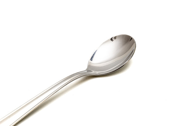 白色背景的金属大勺子图片下载