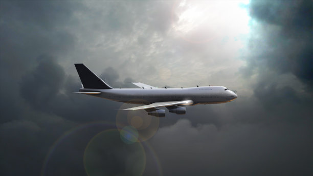 飞机在移动的云层中飞行图片下载