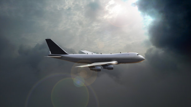 飞机在移动的云层中飞行图片下载