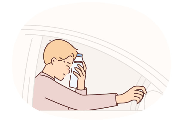 坐在方向盘后面的男司机把水瓶放在额头上感到头痛，闭上眼睛图片下载