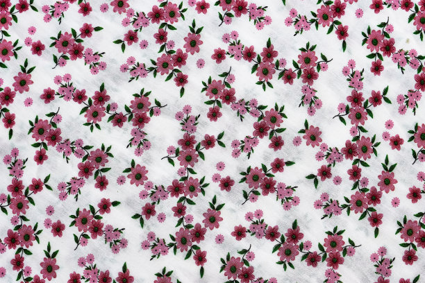 碎片的彩色复古挂毯纺织图案与花卉装饰有用的背景。花卉织物或布料，微距拍摄。面料质地。纸巾，纺织品，布料，材料，机织图片下载