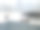形象现代，矩形，闪亮，不锈钢厨房水槽与1.5碗水槽，白色厨房台面，不锈钢搅拌器水龙头，柜台下和壁挂式橱柜，白色瓷砖墙壁，重点在前景图片下载