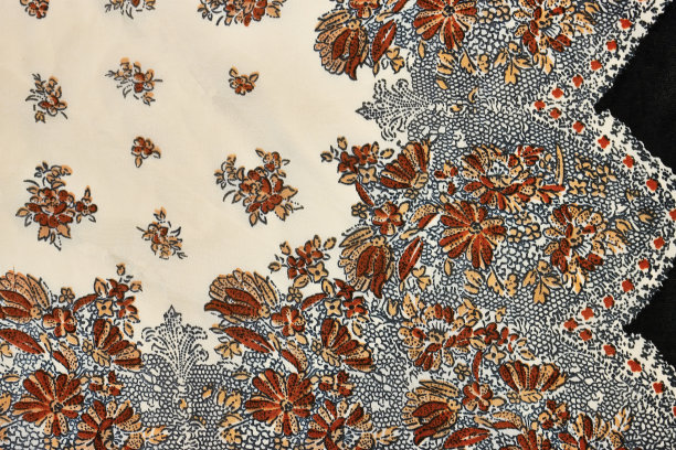 碎片的彩色复古挂毯纺织图案与花卉装饰有用的背景。花卉织物或布料，微距拍摄。面料质地。纸巾，纺织品，布料，材料，机织图片下载