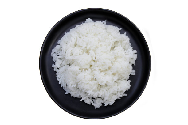 在圆盘子上煮熟的米饭图片下载