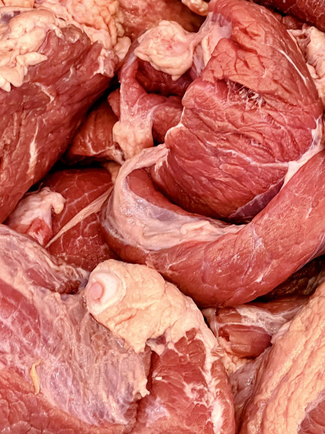 一堆生肉的照片，上面有很多肉。图片下载