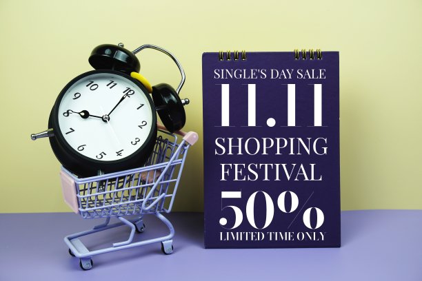 双十一双十一促销，黄色背景的手推车和闹钟，商业概念背景图片下载