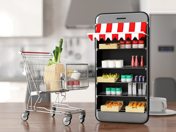 网上杂货店购物概念与市场内的智能手机和手推车图片下载