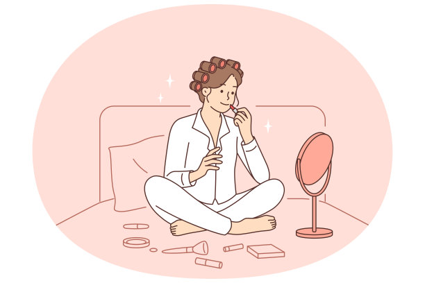 女人一大早坐在床上化妆，对着镜子画嘴唇图片下载