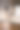 男孩一边喝粥一边在笔记本电脑上看卡通片。图片下载