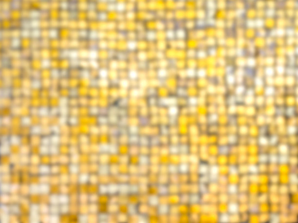 抽象模糊金色亮片马赛克背景。金色豪华闪光图案。模糊照片的节日和庆祝横幅背景概念。图片下载