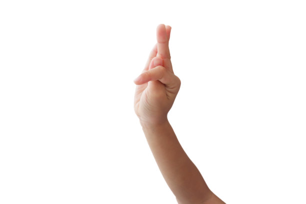 亚洲男孩的手在白色背景上做手势。图片下载