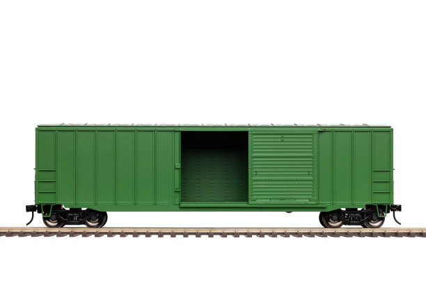 轨道上的绿色铁路车厢图片下载