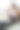 一个拥有笔记本电脑和手机的自由职业女性，穿着家常的衣服，剪着短发，坐在地板上工作，有自由的复印空间图片下载