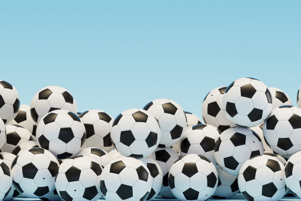 蓝色背景的一堆足球图片下载