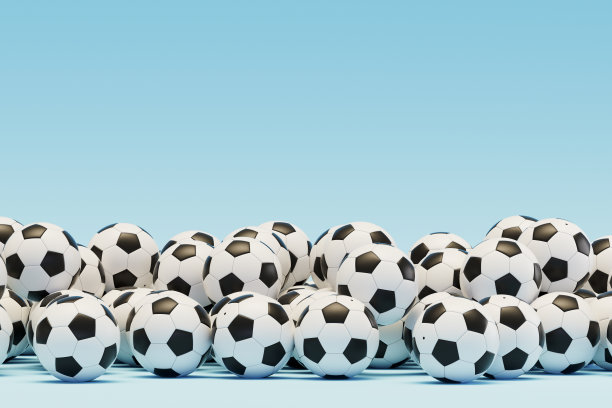 蓝色背景的一堆足球图片下载