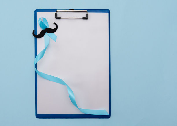 蓝色癌症前列腺意识丝带剪纸胡子剪贴板与空白纸在蓝色背景图片下载