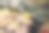 这是一张特写照片，超市里摆放着各种深浅不一的绿色和橙色南瓜，上面还贴着一张价格标签，这张照片充满活力，宣传健康饮食。图片下载