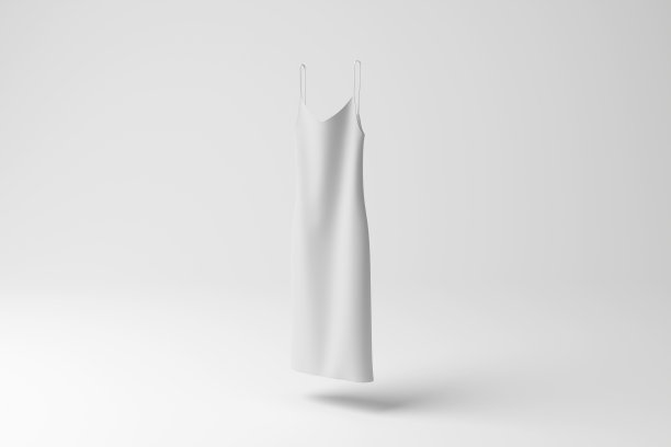 白色长裙漂浮在半空中，白色背景在单色和极简主义。说明女性时尚的概念，纺织行业和服装零售商图片下载